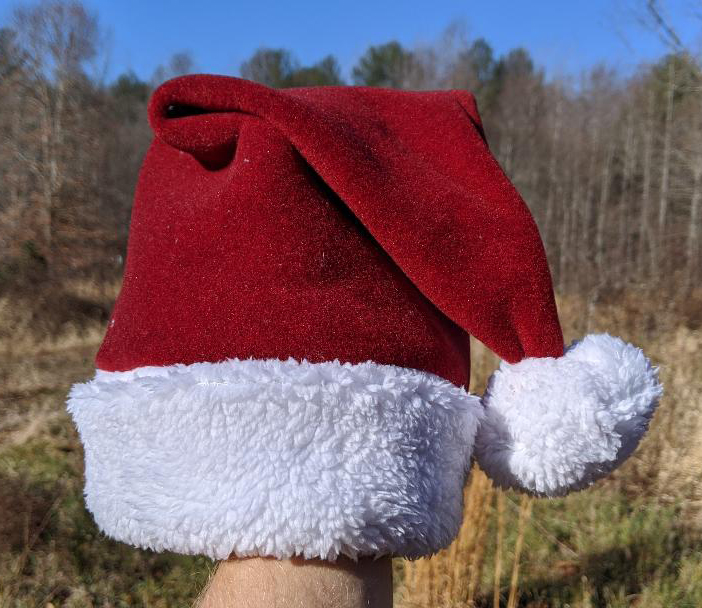 Handmade fleece santa hat.   Deep red top with minky white rolled band and pompom