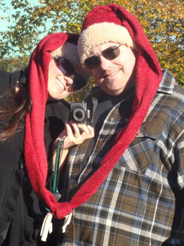 Couple in Super long vintage santa hats